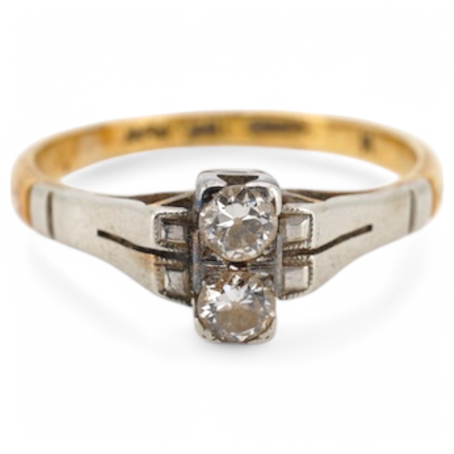 An Art Deco 18ct, plat and two stone diamond set ring, size K, gross weight 2.5 grams. Condition - fair to good